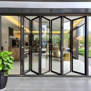 black aluminum bifold folding glass door opening to patio